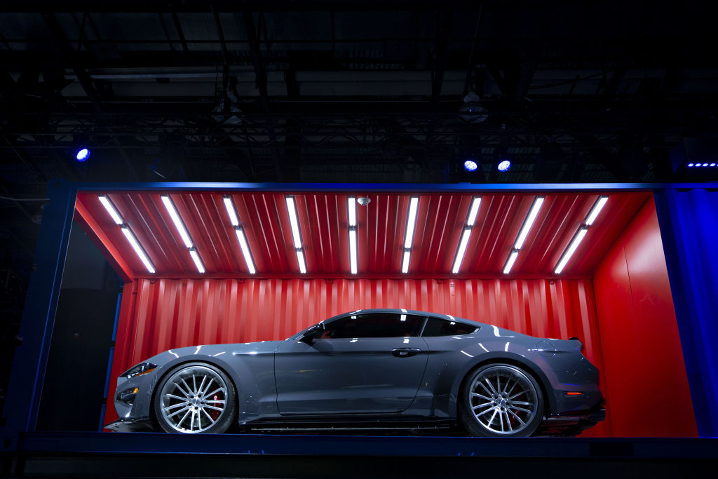 a Ford Mustang Shelby GT500 on display an an auto show