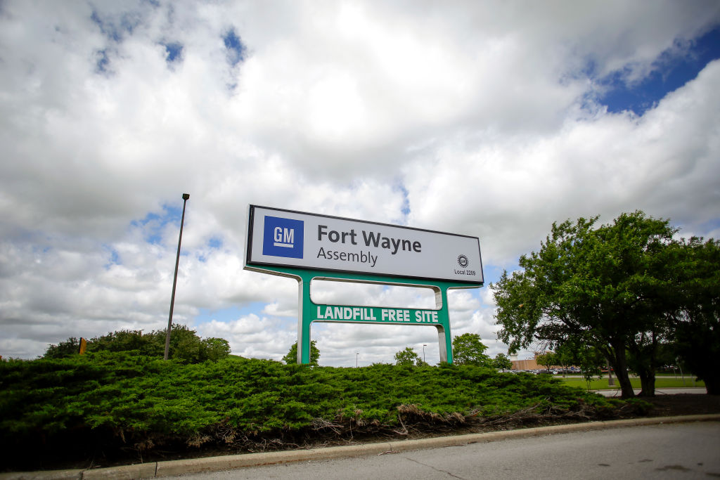 a GM sign at the Fort Wayne assembly plant that manufactures both GMC Sierra and Chevrolet Silverado pickup trucks