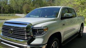 The 2021 Toyota Tundra 1794 CrewMax Edition parked on a farm