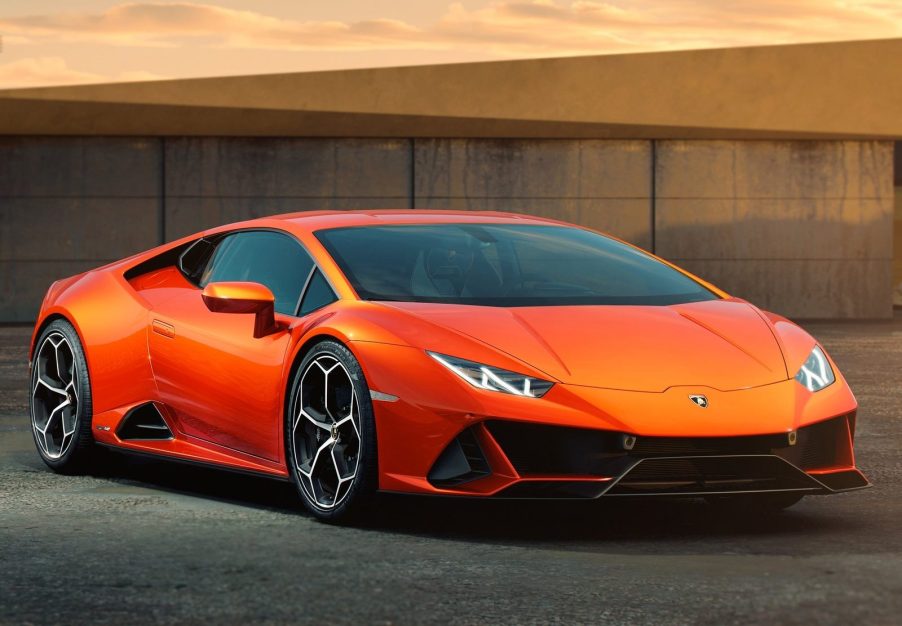 An image of an orange Lamborghini Huracan Evo parked outdoors.