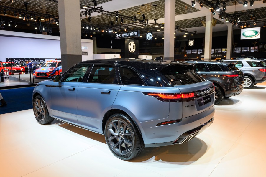 Blue Land Rover Range Rover Velar SVAutobiography Dynamic Edition P550 crossover luxury SUV on display at Brussels Expo