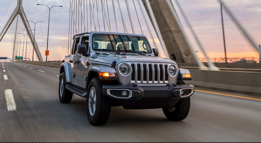 The 2021 Jeep Wrangler Rubicon 392 driving on a bridge