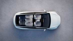 An overhead view of a white Tesla Model X electric seven-seat SUV