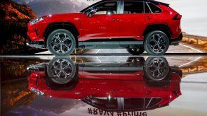 The red Toyota Motor Corp. 2021 RAV4 Prime plug-in hybrid sports utility vehicle (SUV) is displayed during a reveal event at AutoMobility LA