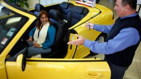 MIAMI - FEBRUARY 20: Freddy MIAMI - FEBRUARY 20: Freddy Melayes shows a new Saab to Karen Cossio at the Deel Saab dealership on February 20, 2009 in Miami, Florida. Saab, the Swedish automaker owned by General Motors, today filed for bankruptcy protection so that it could be spun off or sold. (Photo by Joe Raedle/Getty Images)Melayes shows a new Saab to Karen Cossio at the Deel Saab dealership on February 20, 2009 in Miami, Florida. Saab, the Swedish automaker owned by General Motors, today filed for bankruptcy protection so that it could be spun off or sold. (Photo by Joe Raedle/Getty Images)