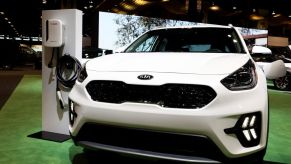 a white kia niro suv up close