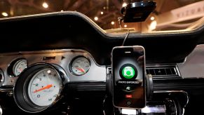 A Cobra iRadar Detection System, consisting of a Cobra radar detector (top) and the Cobra iRadar App for iPhone (bottom), mounted in a 1967 Shelby Cobra GT500 CR at the Specialty Equipment Market Association (SEMA) at the Las Vegas Convention Center in Las Vegas, Nevada, on November 5, 2010