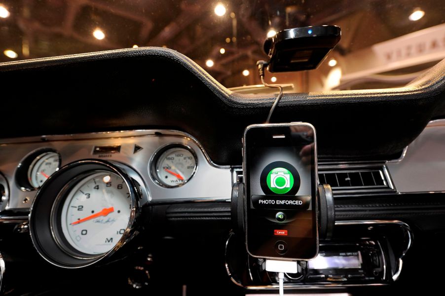 A Cobra iRadar Detection System, consisting of a Cobra radar detector (top) and the Cobra iRadar App for iPhone (bottom), mounted in a 1967 Shelby Cobra GT500 CR at the Specialty Equipment Market Association (SEMA) at the Las Vegas Convention Center in Las Vegas, Nevada, on November 5, 2010