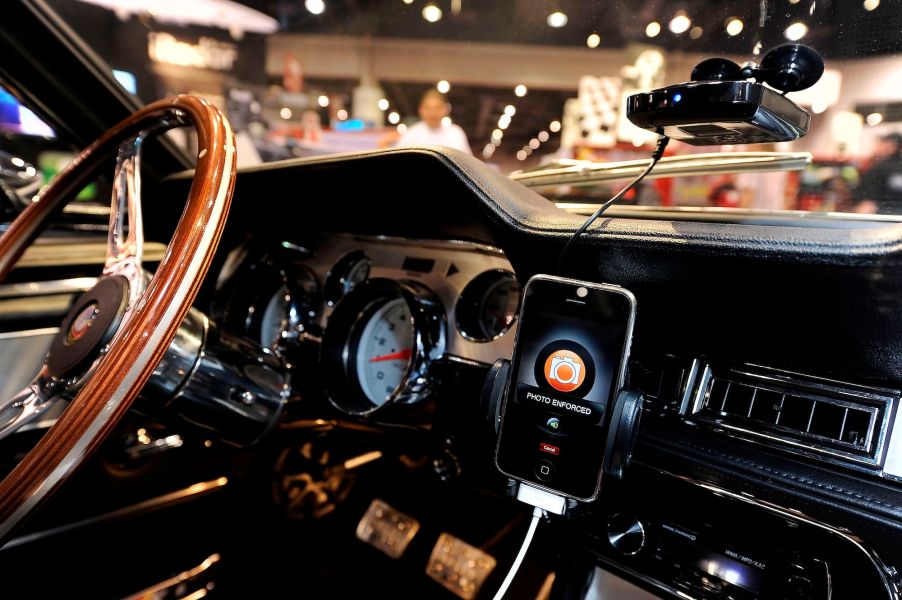 A Cobra radar detector and iPhone app mounted in a 1967 Shelby Cobra GT500 CR