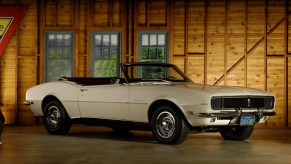 A white A 1969 Chevy Camaro 327 rally sport convertible