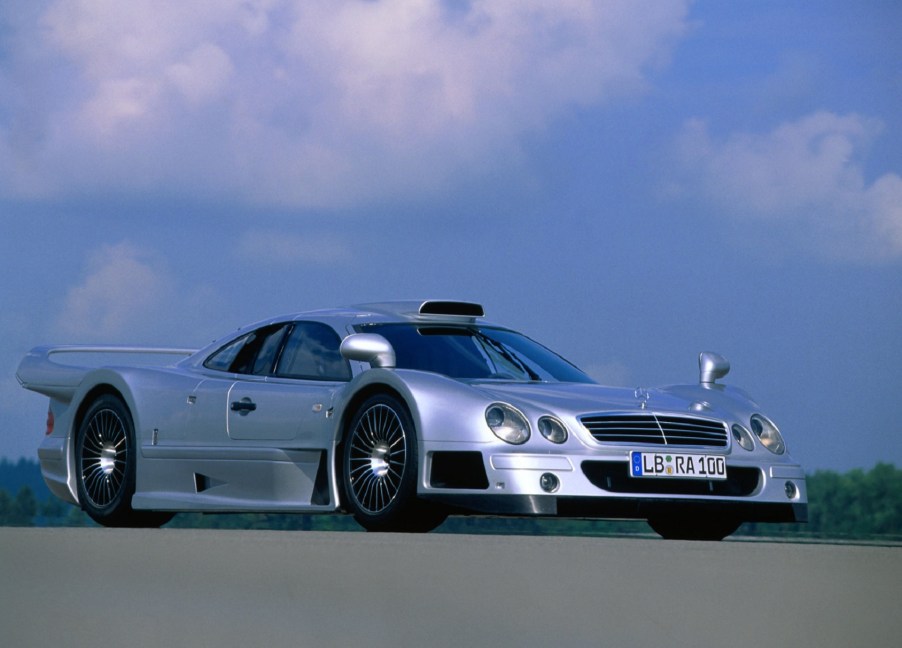 A silver 1999 Mercedes CLK GTR on a racetrack