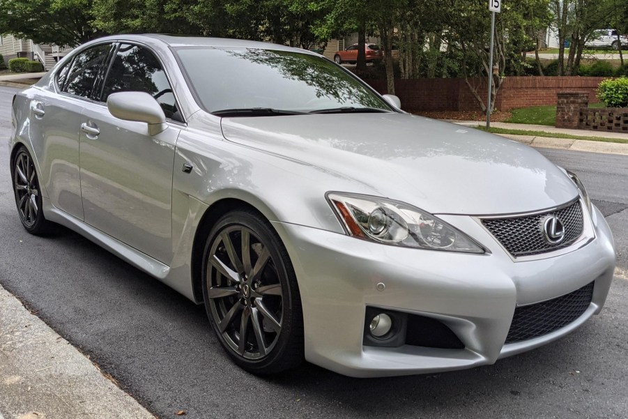 The front 3/4 view of a silver 2008 Lexus IS F parked on the street