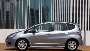 A silver 2009 Honda Fit parked, the Fit is one of the best cheap used cars under $5,000