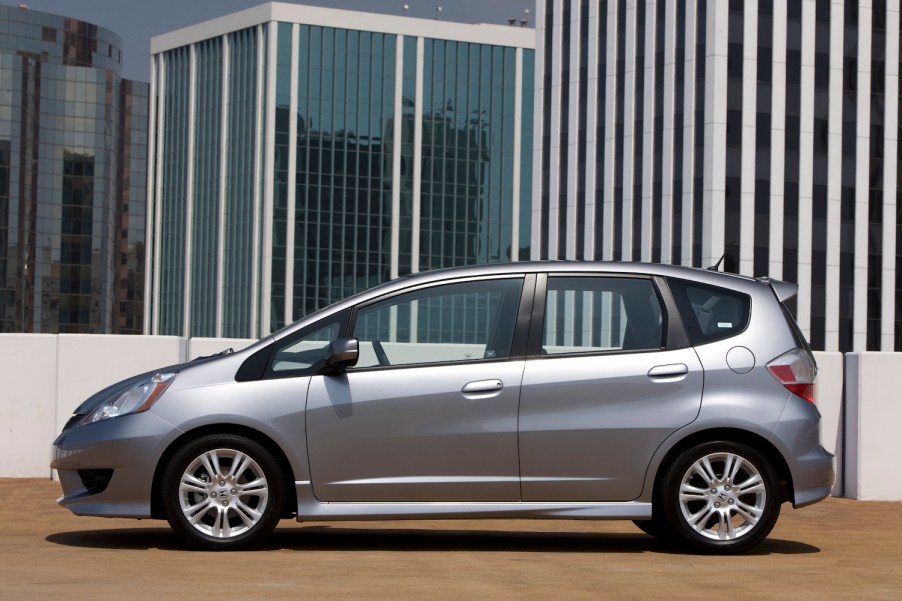 A silver 2009 Honda Fit parked, the Fit is one of the best cheap used cars under $5,000