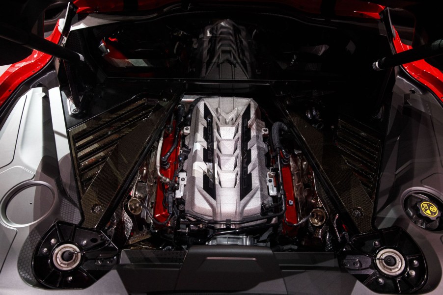 The engine of a red 2020 Chevy Corvette C8 Stingray sports car on display during an unveiling event in Tustin, California, in July 2019