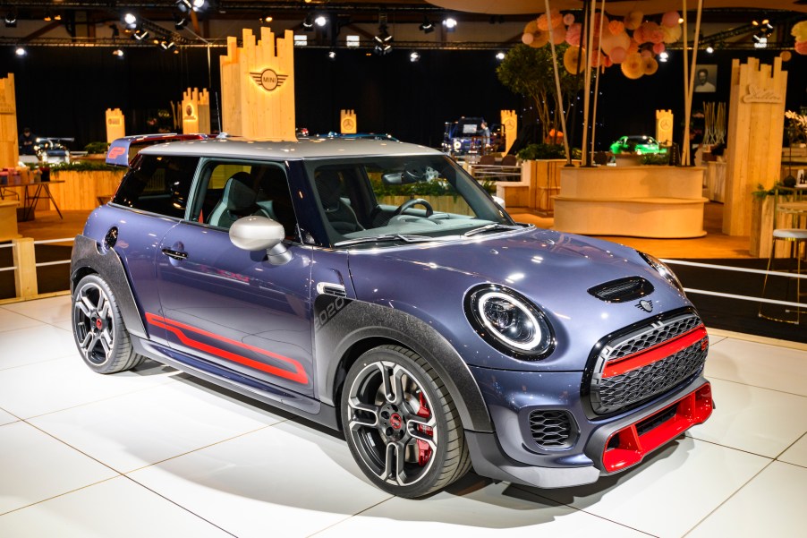 A blue and red 2020 Mini Cooper John Cooper Works subcompact car on display at Brussels Expo on January 9, 2020, in Brussels, Belgium