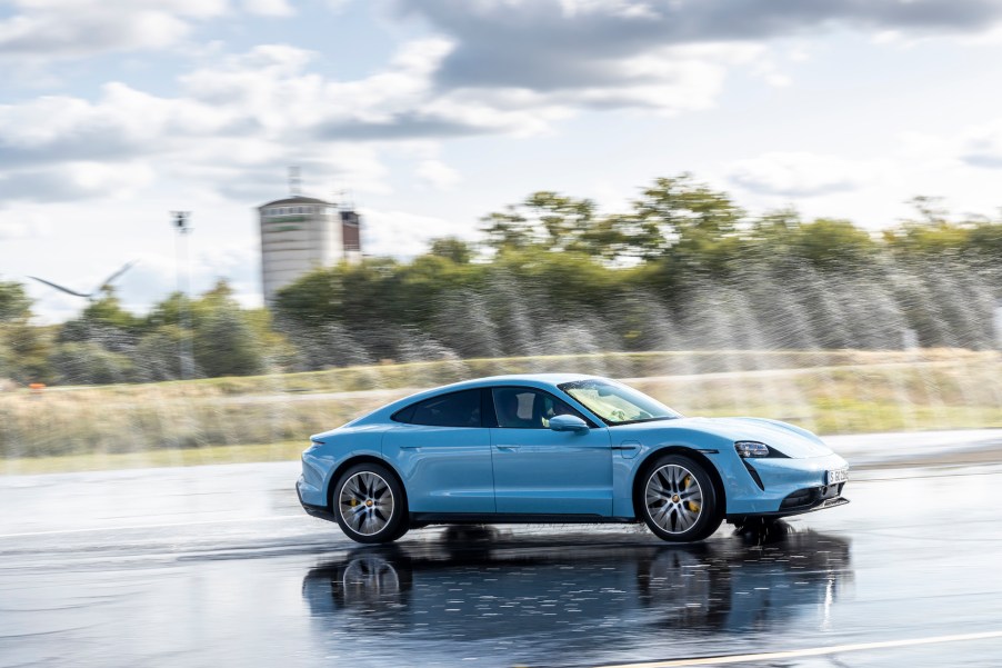 A sky-blue Porsche Taycan 4S electric sedan at the Taycan Regional Tour 2020 in Lüneburg, Germany