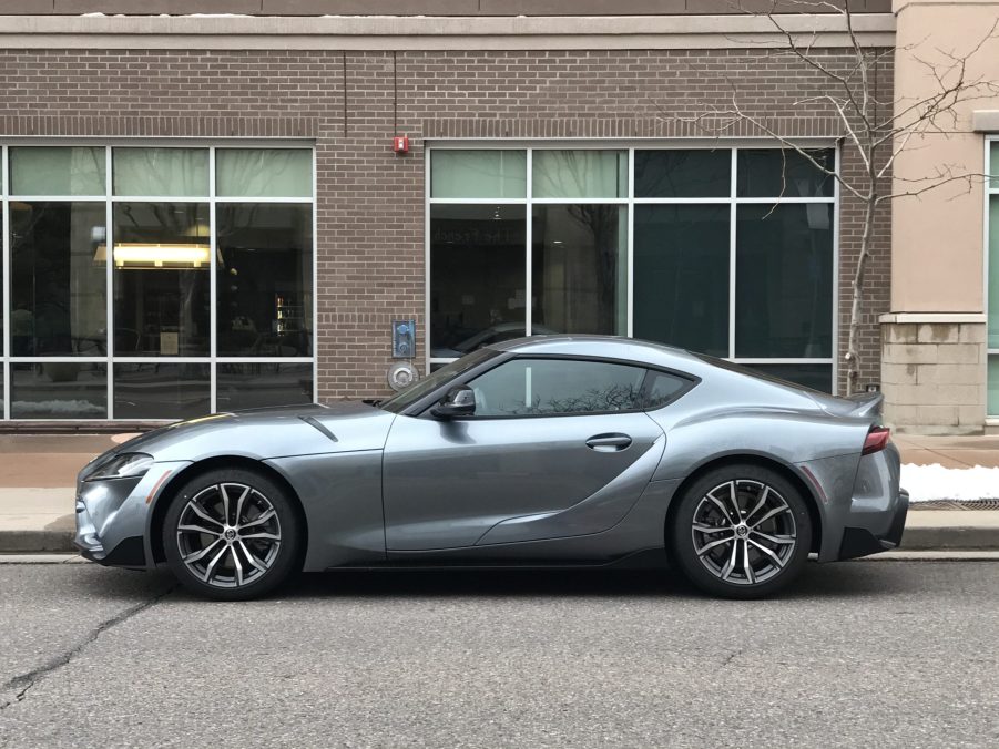 2021 toyota supra side shot in a city