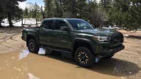 2021 Toyota Tacoma TRD lift kit in a puddle