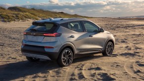 A silver 2022 Chevy Bolt EUV parked on a beach