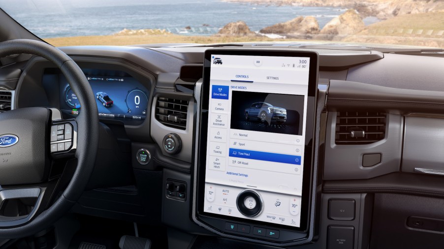 A 15.5-inch touchscreen mounted to a 2022 Ford F-150 Lightning electric pickup truck's center console