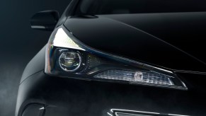 Dark car colors, such as this blacked-out 2022 Toyota Prius Nightshade Edition, remain popular