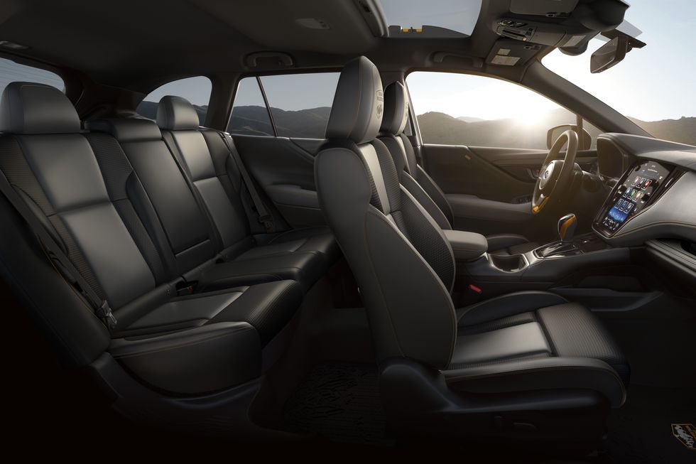 A side shot of the 2022 Subaru Outback Wilderness interior with black upholstery 