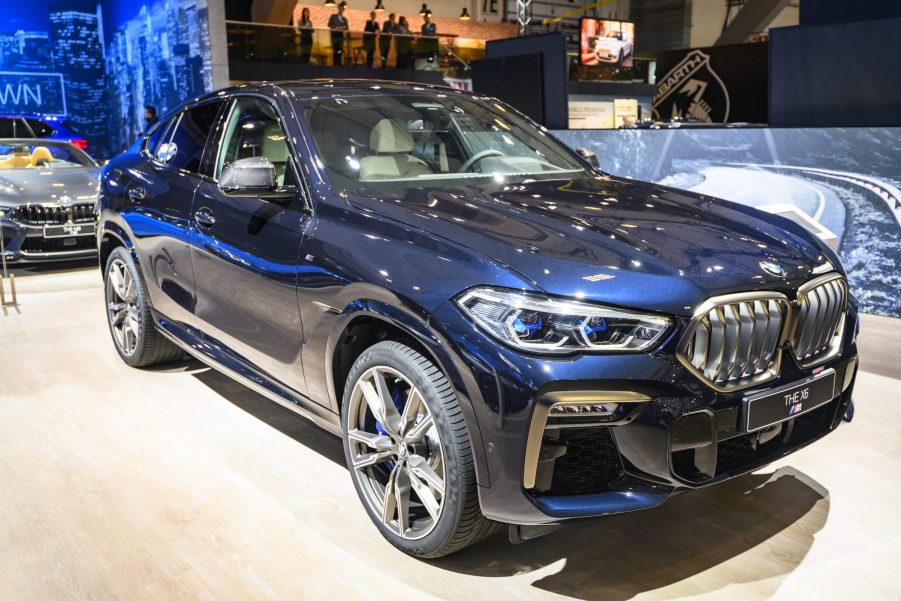 Blue BMW X6 luxury crossover SUV on display at Brussels Expo