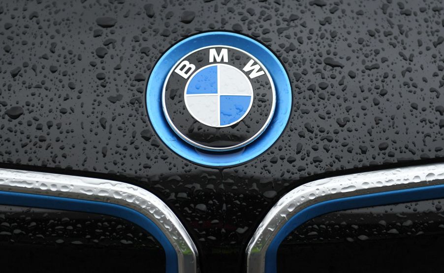 A BMW logo on the hood of a black car on March 15, 2021, in Munich, Germany