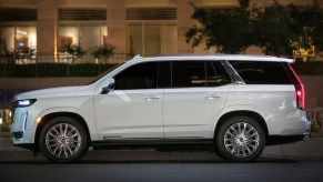 A 2021 Cadillac Escalade is parked on a street.