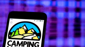 The Camping World logo displayed on a smartphone