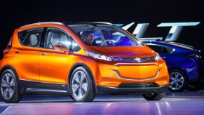 orange Chevy Bolt on stage