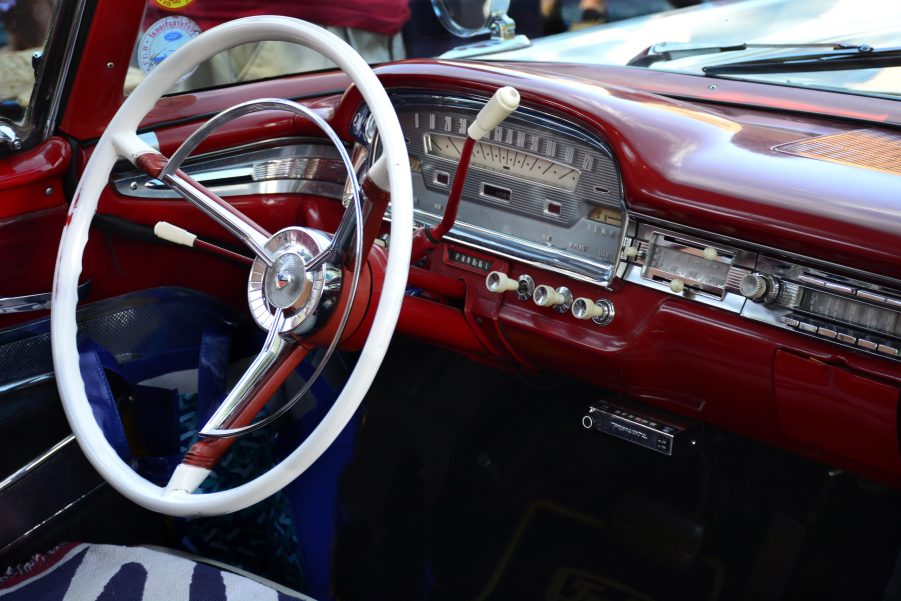 White steering wheel of a classic 1956 Ford Fairlane