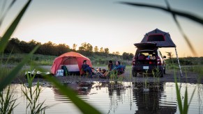 A family camping in a 2021 Ford Bronco Sport, one of the best SUVs for camping.