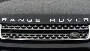 The grille of the Range Rover in the rain