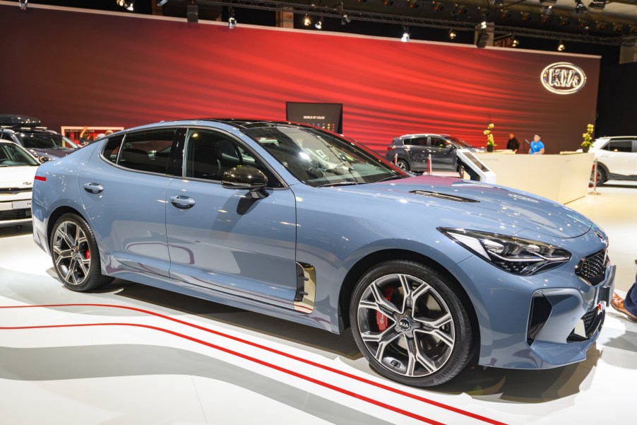 A blue Kia CK Stinger on display