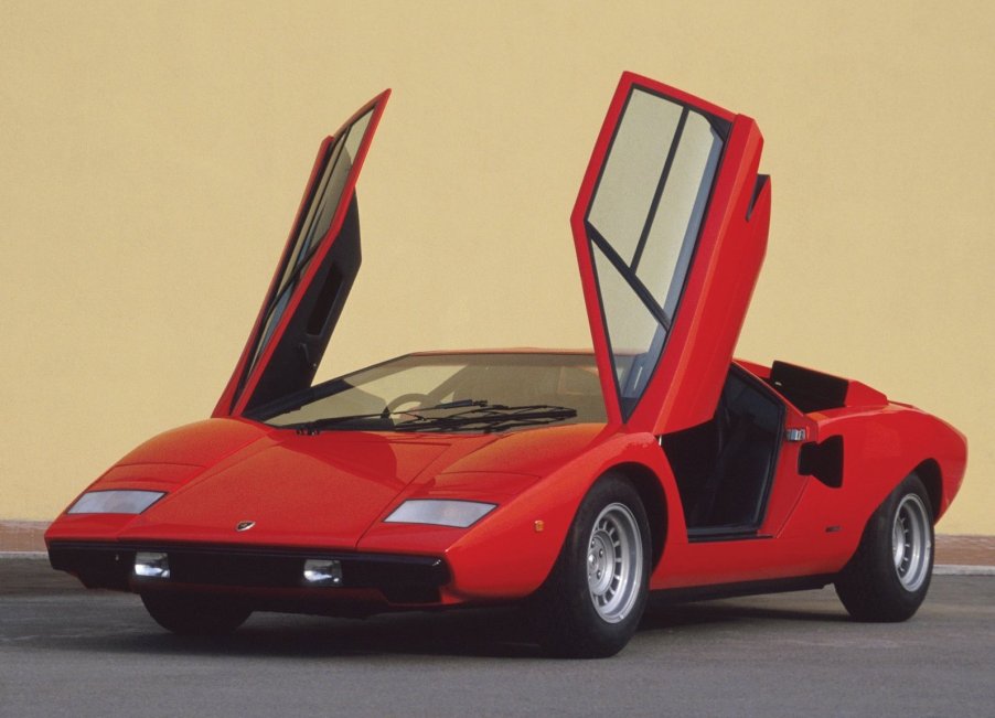 An image of a red Lamborghini Countach LP400 parked outdoors.