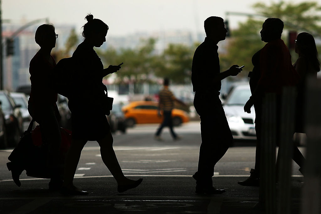 pedestrians in shadows