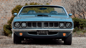 An image of a Plymouth Hemi Cuda Convertible parked outdoors.