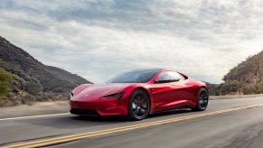 An image of a Tesla Roadster outdoors.