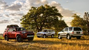 Three 2021 Toyota 4Runner SUVs parked in a field