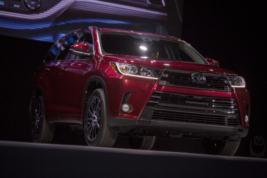 A red Toyota Highlander on display