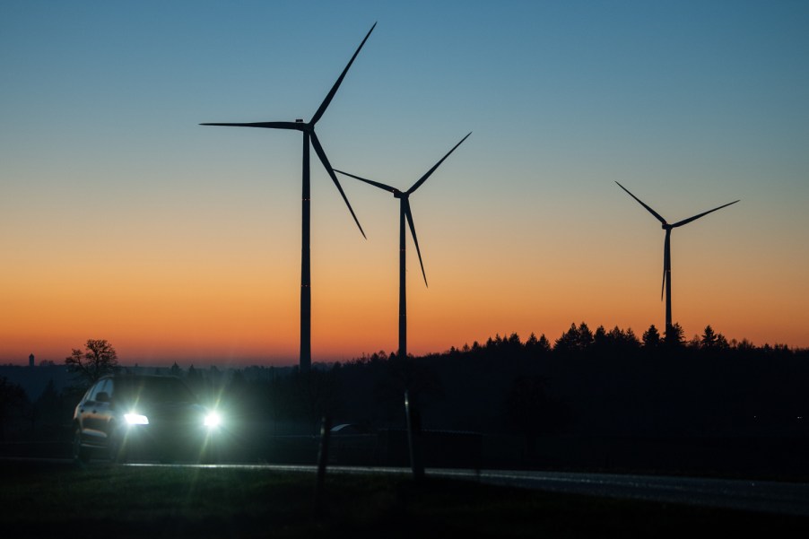 An electric vehicle traveling at dawn