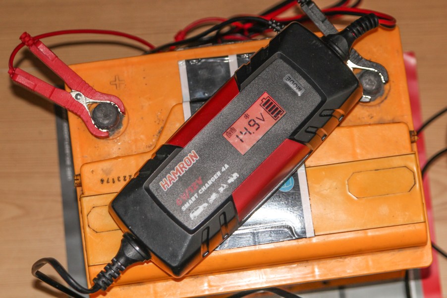 Car battery charging process with using a Hamron (Swedish Jula hardware stores brand) smart charger is seen in Gdansk, Poland on 17 October 2019 (Photo by Michal Fludra/NurPhoto via Getty Images)