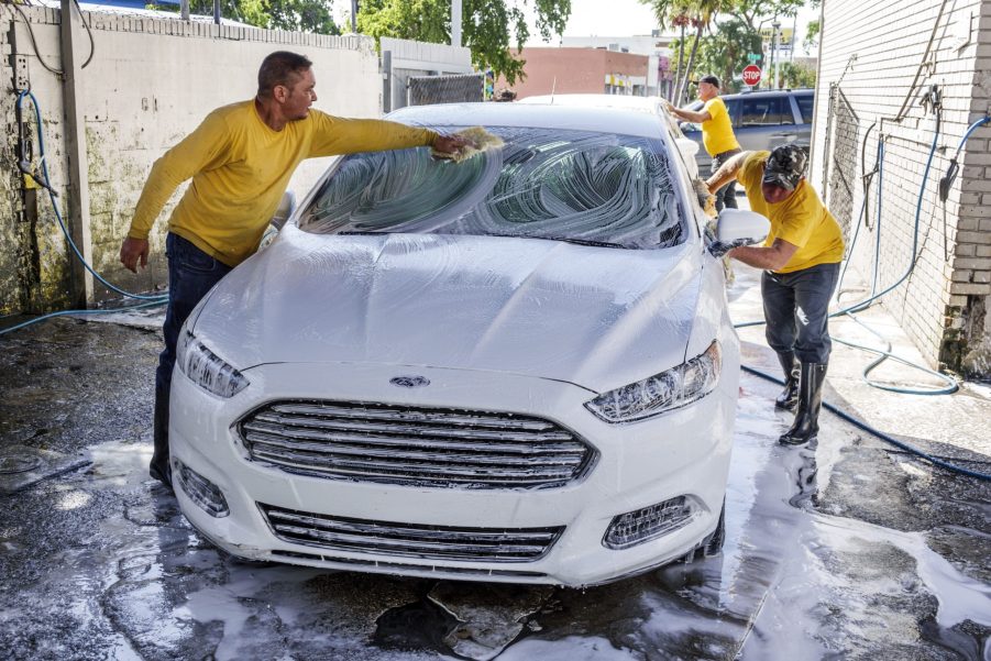 Men washing a car