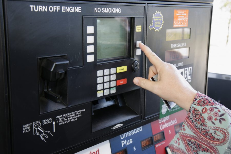 a customer uses the keypad on a gas pump