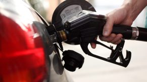 A gas pump fills up a gas tank