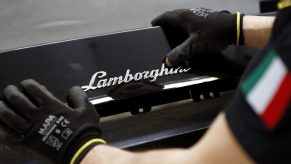 A cursive lamborghini badge