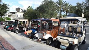 Golf carts line the street in the the Villages retirement community outside of Orlando, Florida, on October 4, 2016