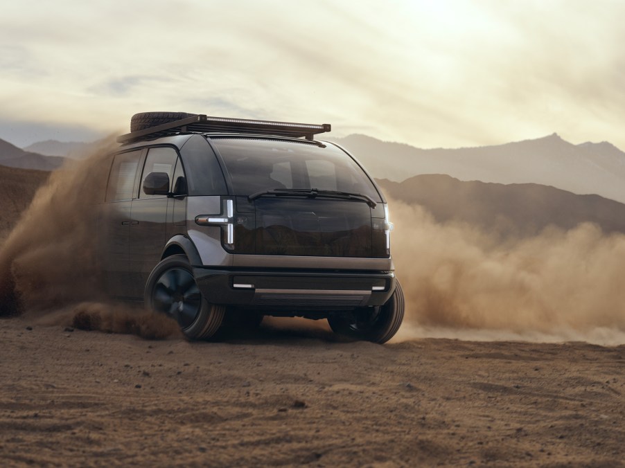 The 2022 Canoo Lifestyle van kicking up dirt